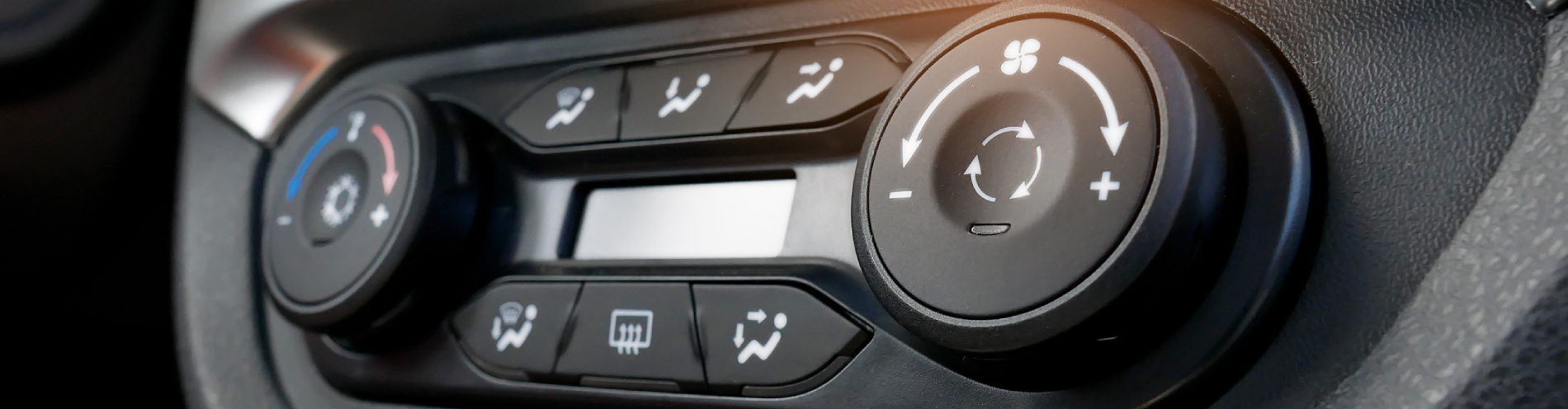 Air conditioning button inside a car. Modern car interior details. Selective focus